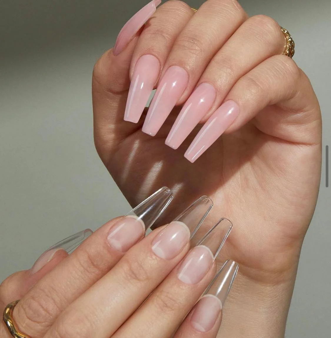 Close-up of BIAB builder gel manicure on short natural nails in a warm nude shade