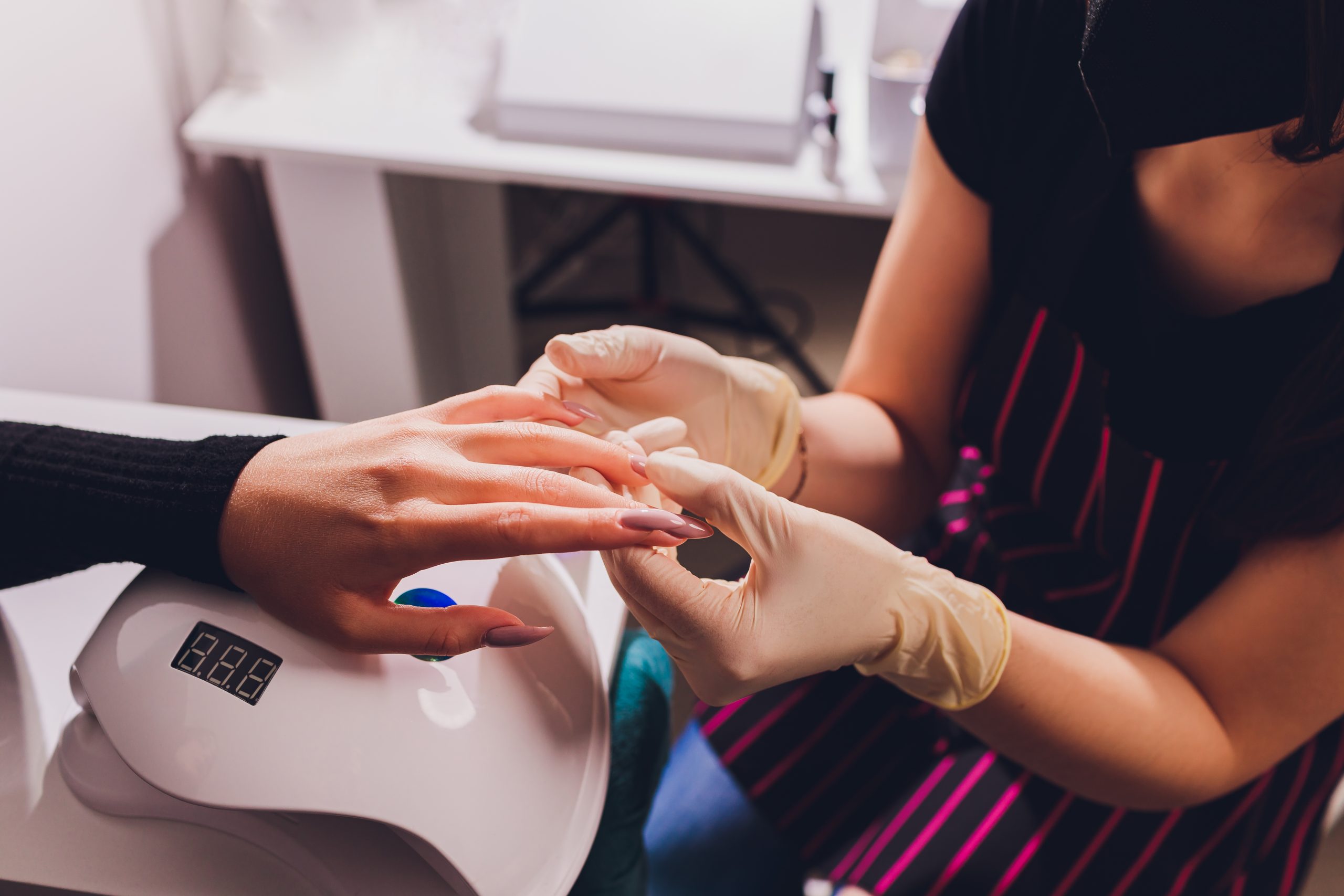Express manicure with quick file and polish refresh on natural nails